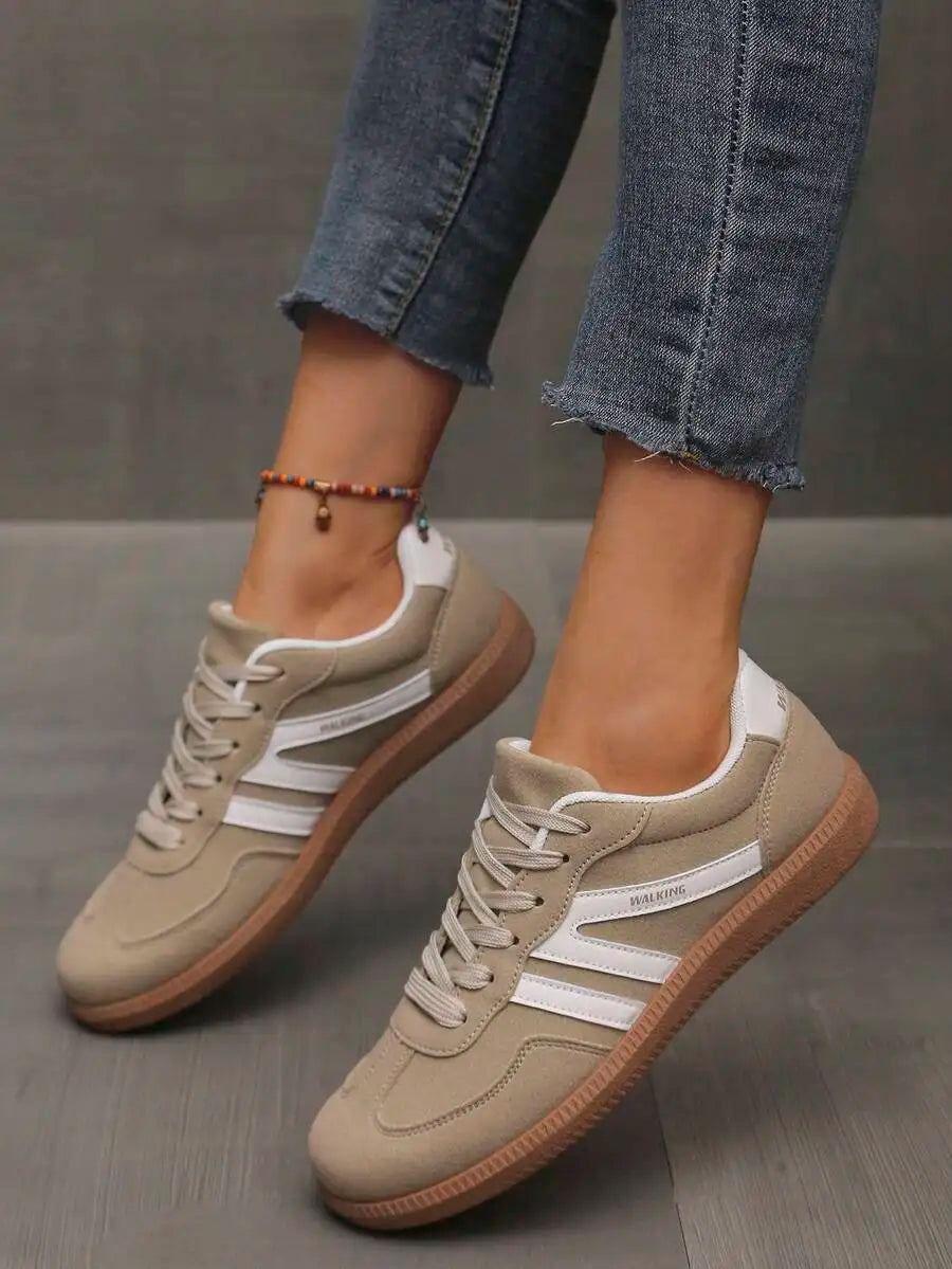 CNUO Casual Flat Sneakers With White Stripes For Women.
