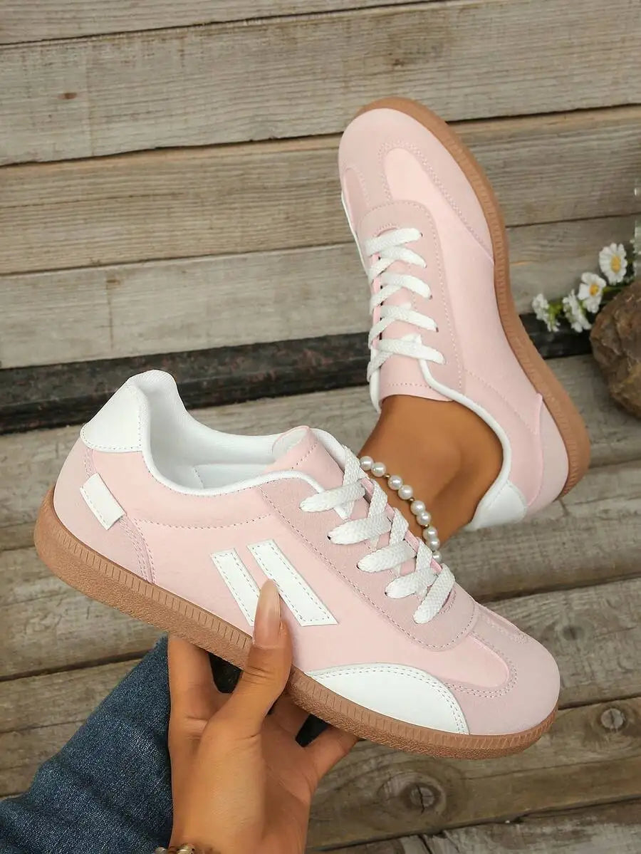 CNUO Casual Flat Sneakers With White Stripes For Women.
