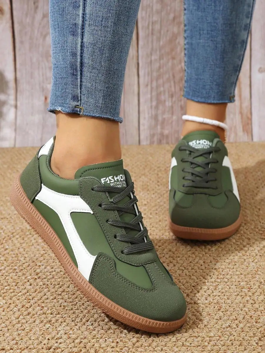 CNUO Casual Flat Sneakers With White Stripes For Women.