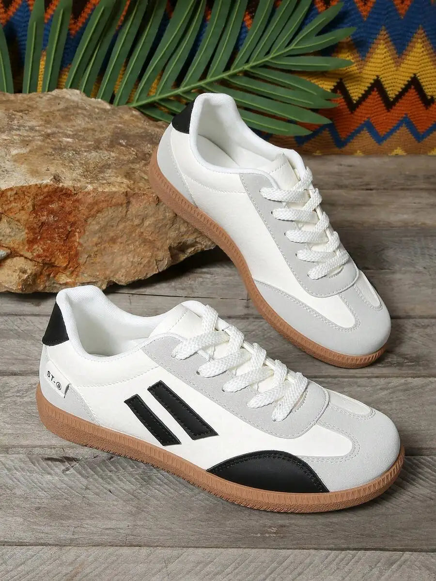 CNUO Casual Flat Sneakers With White Stripes For Women.