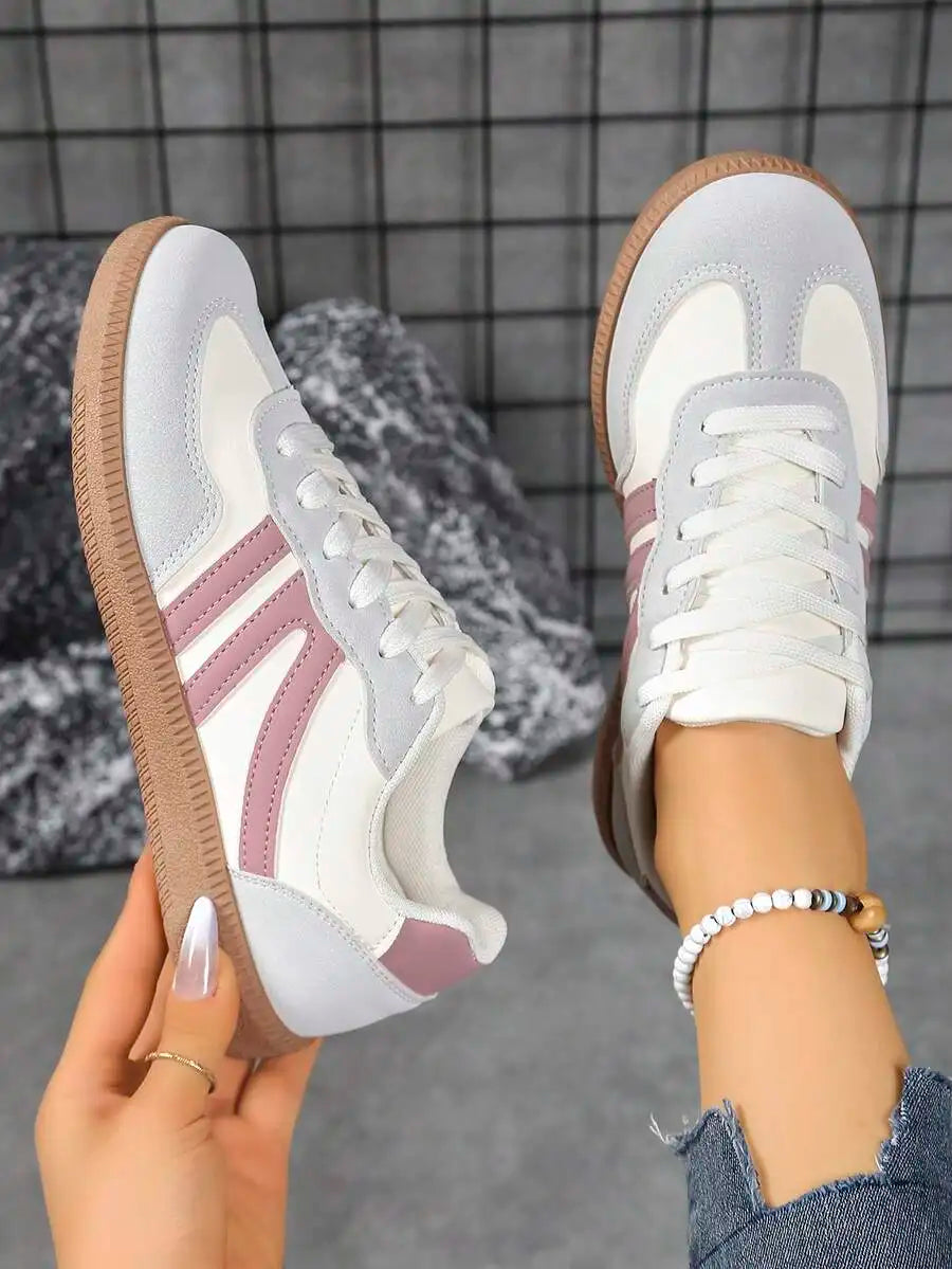 CNUO Casual Flat Sneakers With White Stripes For Women.