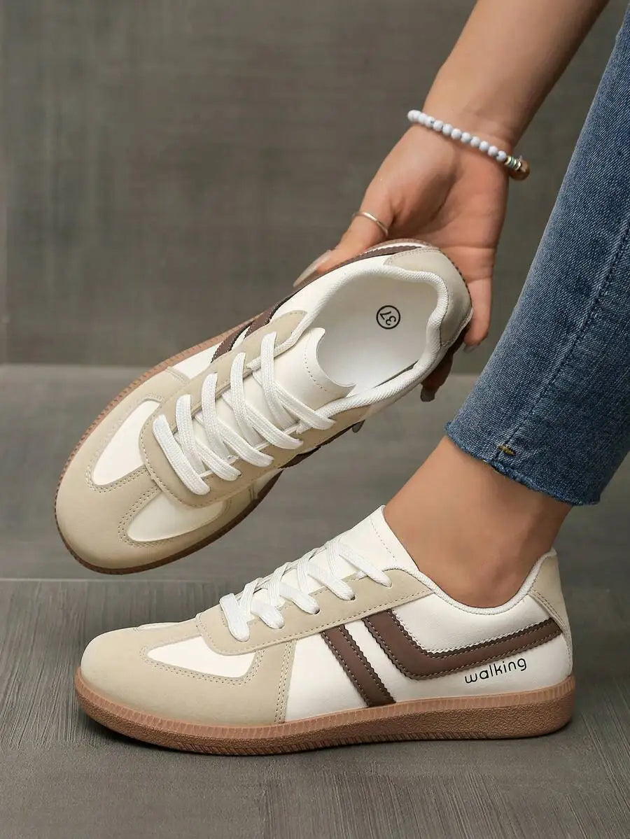 CNUO Casual Flat Sneakers With White Stripes For Women.