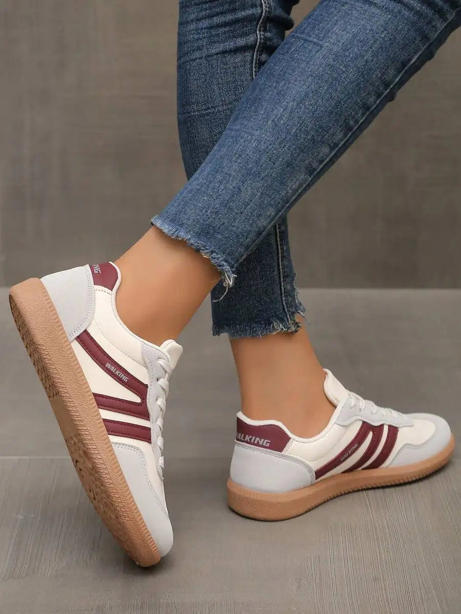 CNUO Casual Flat Sneakers With White Stripes For Women.