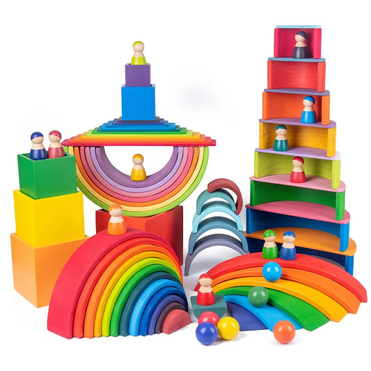 Wooden rainbow stacking blocks .