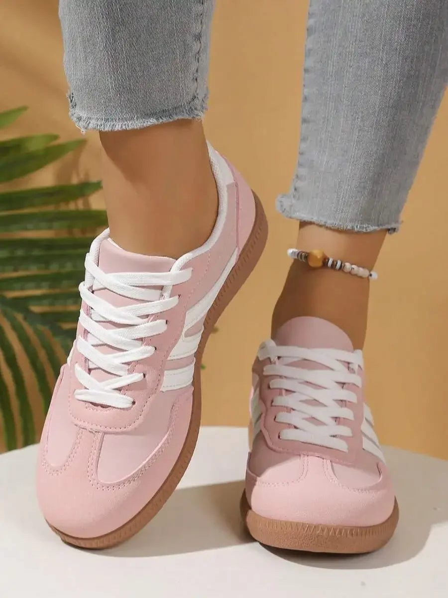 CNUO Casual Flat Sneakers With White Stripes For Women.