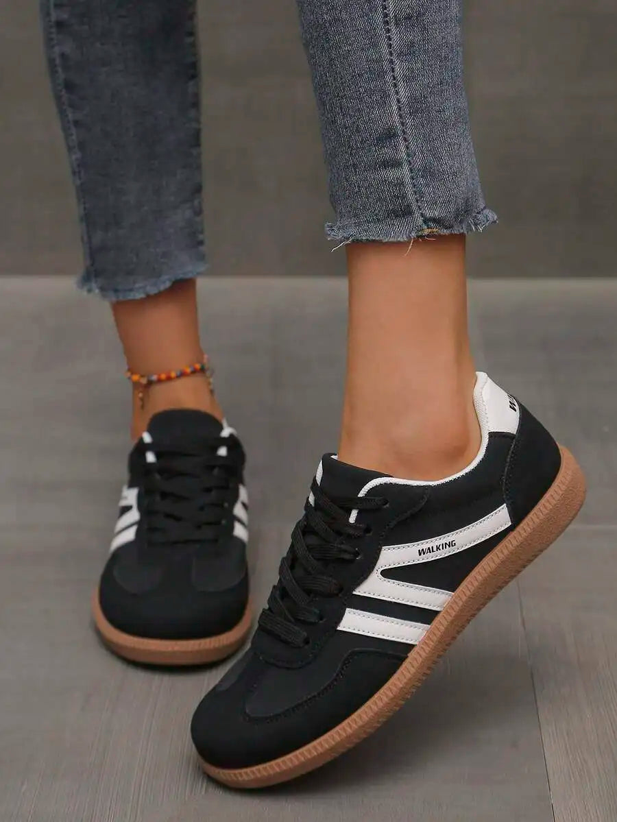 CNUO Casual Flat Sneakers With White Stripes For Women.