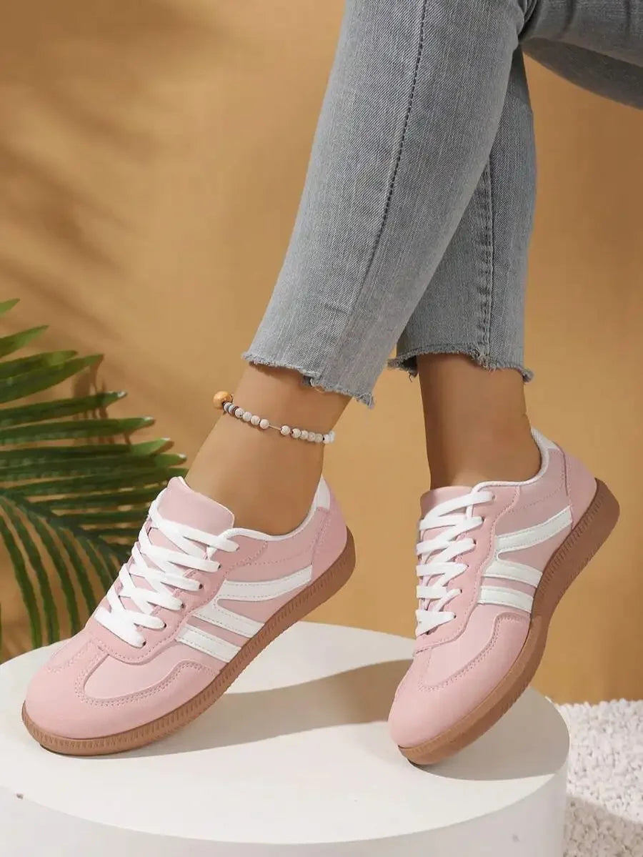 CNUO Casual Flat Sneakers With White Stripes For Women.